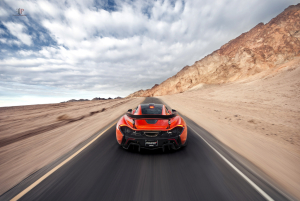 Orange McLaren P1 Accelerating