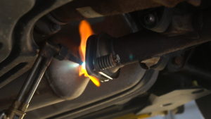 Torch heating a bolt