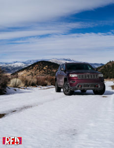 Jeep Grand Cherokee Trailhawk on snowy dirt road