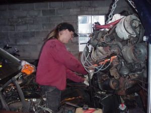Justin standing in engine bay